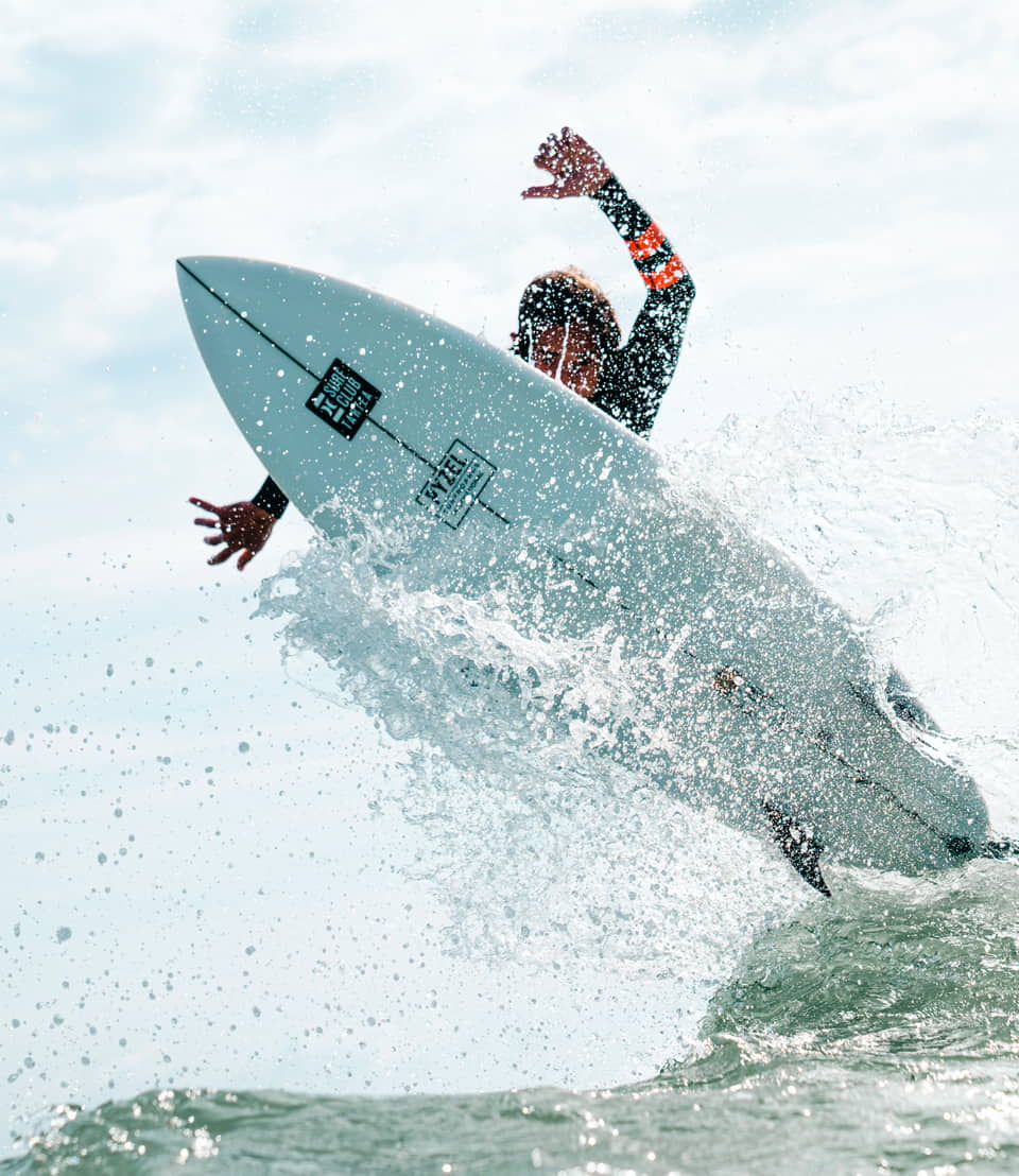 Surfer doing a turn on a wave